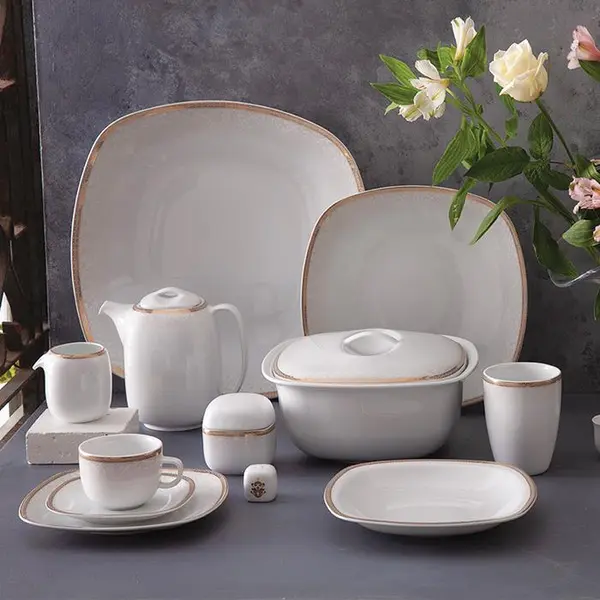 سرویس غذاخوری زرین 98 پارچه 12 نفره سری کواترو طرح ریوا طلایی درجه یک Zarin Iran Quatro Riva Dinnerware Set 98 Pcs High Grade