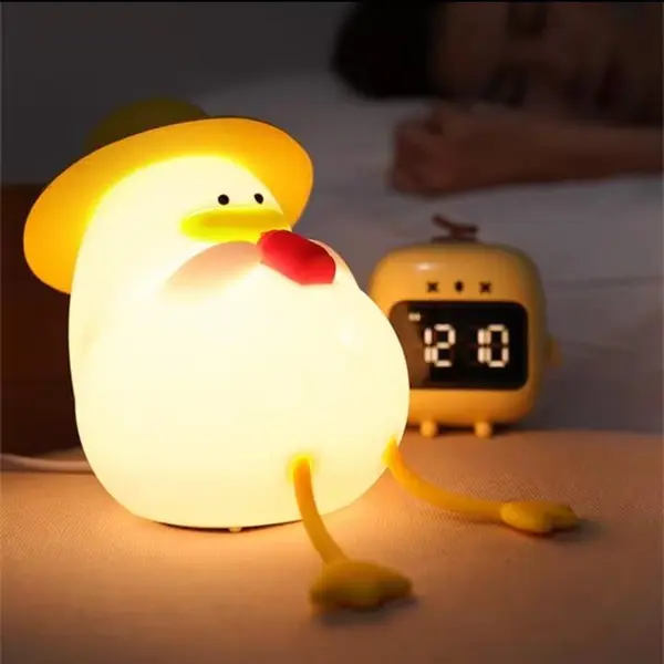 چراغ خواب سیلیکونی جوجه اردک کلاه دار کد 68 - 3
