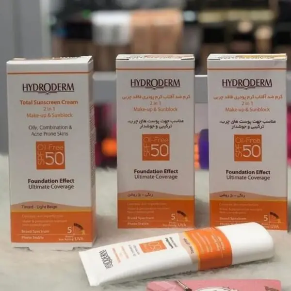 ضدآفتاب هیدرودرم کرمپودری spf50 فاقد چربی دارای رنگ بژ روشن و بژ طبیعی حجم 40 میل - 2