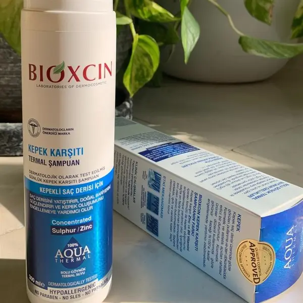 شامپو ضد ریزش مو برند بیوکسین  مدلbiotin حجم 300ml - 2