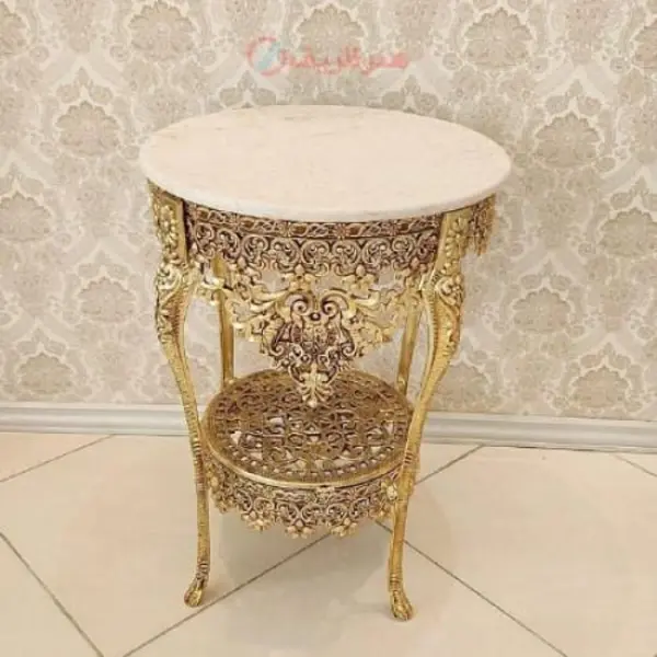 میز خاطره گرد 2 طبقه با کفی مشبک ساخته شده با آلیاژ آلومنیوم اعلاء، آبکاری برنز رنگ ثابت، عرض 50